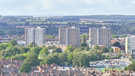 Sunlight-spreads-across-rooftops-of-Doncaster-England-suburban-homes-and-apartment-buildings