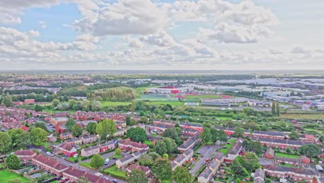 Aerial-panoramic-overview-of-stunning-idyllic-town-of-Doncaster-at-sunrise,-green-suburbs-and-cloudy-sky