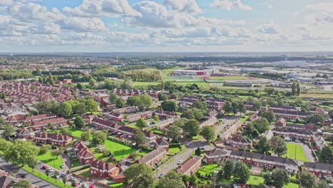Panoramic-aerial-overview-of-subdivision-homes-in-Doncaster-England-on-a-sunny-blue-sky-day