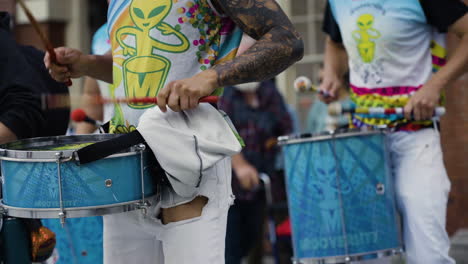 Slow-motion-shot-of-a-drum-group-performing-in-the-streets-of-downtown-Boston