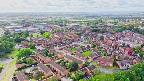 Aerial-panoramic-overview-of-suburban-neighborhood-with-soft-pastel-sprawling-view-to-the-distance