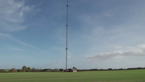 Communication-Tower-on-Field,-Cellphone-Coverage-GSM-5G---Truck-Shot