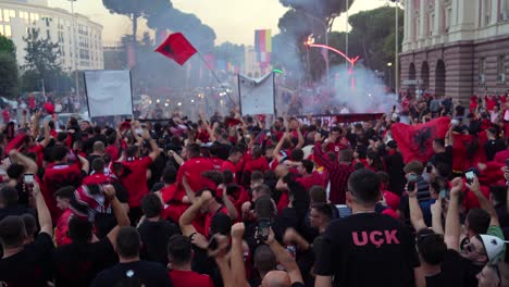 Albanian-Football-Fans:-Crowded-Streets,-Vibrant-Red-Flags,-and-Deafening-Cheers-–-A-Thrilling-Gathering-of-Enthusiastic-Supporters