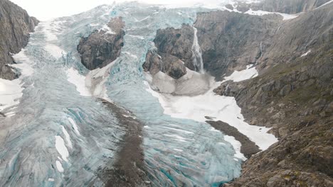 Closing-up-drone-footage-of-glacier-in-Folgefonna-national-park-in-Norway,-Buerbreen