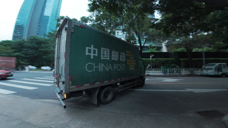 China-post-mail-truck-departing-from-express-delivery-station