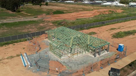 Yarrawonga,-Victoria,-Australia---20-October-2023:-Low-and-close-aerial-view-of-a-new-house-frame-in-the-Silverwoods-Estate-at-Yarrawonga,-Victoria,-Australia