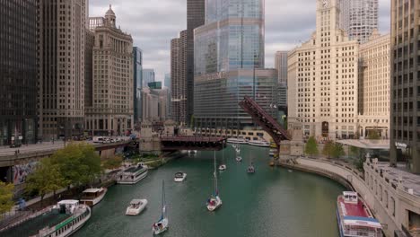 Chicago-river-bridge-lift-with-sailboats-aerial-view