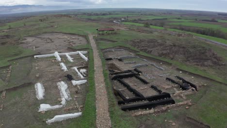 A-bird's-eye-view-of-ancient-ruins-in-an-empty-field-in-Bulgaria