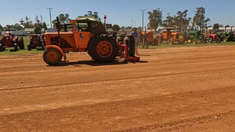 Yarrawonga,-Victoria,-Australia---7-October-2023:-A-grading-tractor-maintaining-the-tractor-pull-track-at-the-Yarrawonga-Show-in-Victoria-Australia