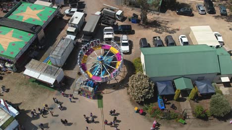 Yarrawonga,-Victoria,-Australia---7-October-2023:-Aerial-view-of-the-Tornado-amusement-ride-slowing-down-at-the-Yarrawonga-Show-in-Victoria-Australia