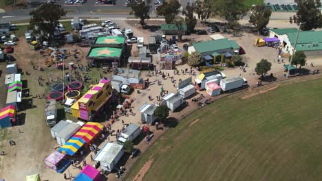 Yarrawonga,-Victoria,-Australia---7-October-2023:-Aerial-descending-over-the-amusement-rides-at-the-Yarrawonga-Show-in-Victoria-Australia