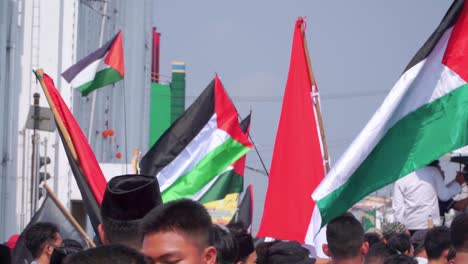 Close-up-shot-of-Indonesian-People-demonstrating-for-Palestine-during-war-against-Israel---Slow-motion-shot
