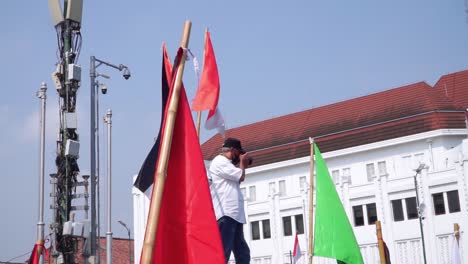 Protesters-wave-their-flags-during-the-demonstration-in-support-of-Palestine-in-Jakarta