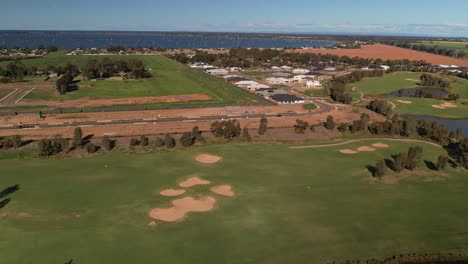 Over-golf-course-towards-new-homes-at-Silverwoods-Estate-and-Lake-Mulwala-in-the-background