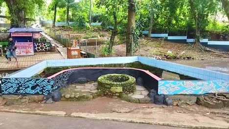 The-holy-well-in-turtle-tourism-or-Cikuya-Belawa-Cirebon,-West-Java,-Indonesia