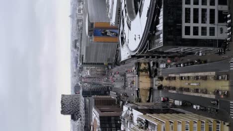 Vertical-aerial-view-of-the-European-District-on-snowy-winter-day-in-Brussels,-Belgium