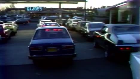 1970s-LONG-LINES-OF-CARS-WAITING-TO-GET-FUEL-AT-GAS-STATION