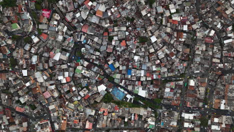 Aerial-top-down-shot-above-ghetto-homes-in-Comuna-13,-Medellín,-Colombia