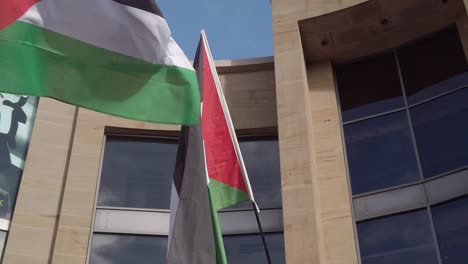 Close-up-of-two-Palestine-flags-at-a-Glasgow-protest
