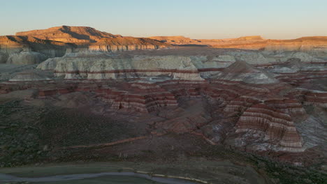 Drone-shot-of-painted-desert-and-river-landscape