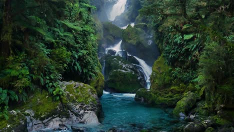 stunning-rainforest-waterfall-with-blue-water-in-New-Zealand
