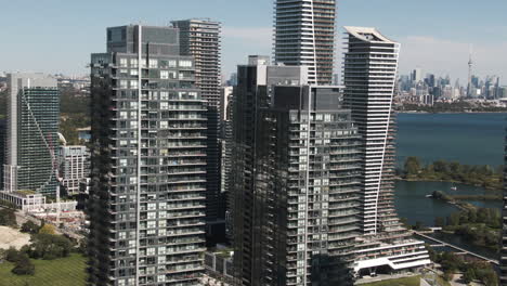 Glass-and-concrete-skyscrapers-of-Lake-Ontario-are-shining-above-the-ground-on-a-sunny-day