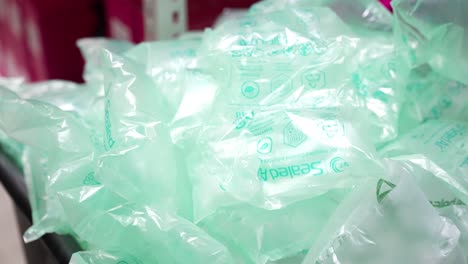 Pile-of-plastic-airbags-used-for-product-packaging-a-shipment-pile-up-in-a-box-ready-to-re-use-as-part-of-recycling-and-sustainability-initiative-to-help-the-planet-with-excess-plastic-use