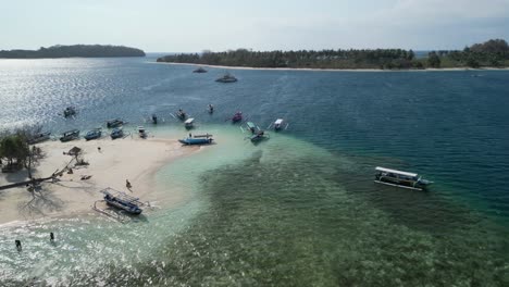 Aerial-of-Gili-Kedis,-a-charming-little-gem-located-in-the-Sekotong-area-of-Indonesia,-perfect-destination-to-enjoy-quality-time-with-friends-and-family