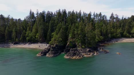Aerial-Orbital-View-of-Moresby-Island's-Coastal-Forest,-Rocky-Outcrops,-and-Beach-Coves-in-BC,-Canada