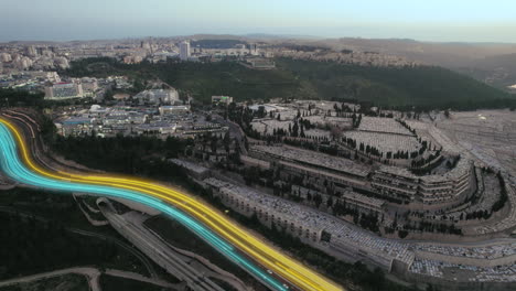 Digital-lines-showing-the-traffic-at-the-entrance-to-Jerusalem,-Israel-and-Har-HaMenuchot-cemetery