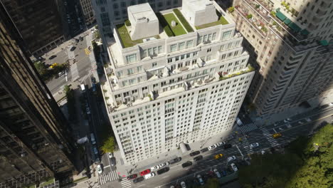 Aerial-high-angle-shot-around-the-15-Central-park-west-condo,-in-sunny-New-York