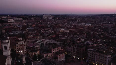 Drone-flyover-of-Spanish-Steps-and-Roman-streets-at-sunset