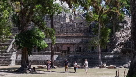 Tourists-pose-for-photos-in-front-of-ancient-Copan-Mayan-pyramid-ruin