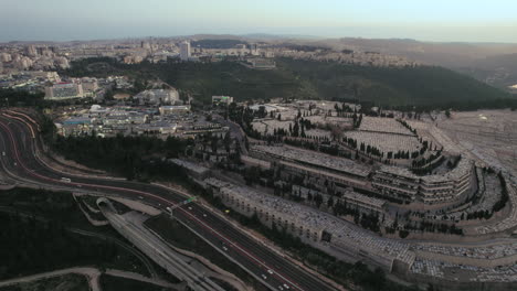 Static-shot-over-the-entrance-to-Jerusalem,-Israel-and-Har-HaMenuchot-cemetery