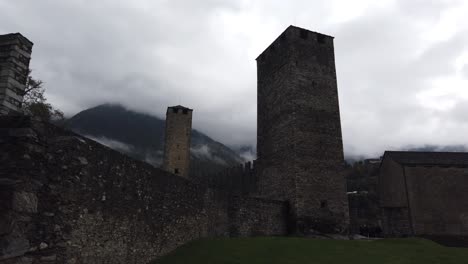 Panoramic-of-Castles-of-Bellinzona-Ancient-Swiss-Alps-Fort-of-Stone-Walls-Travel-Destination-in-Ticino-Canton
