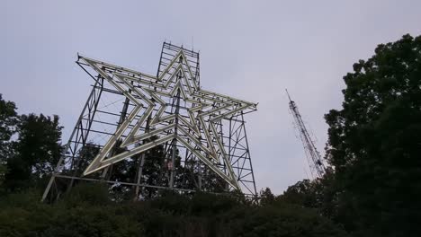 Low-Angle-View-Looking-Up-At-The-Roanoke-Star,-also-known-as-the-Mill-Mountain-Star,-is-the-world's-largest-freestanding-illuminated-man-made-star