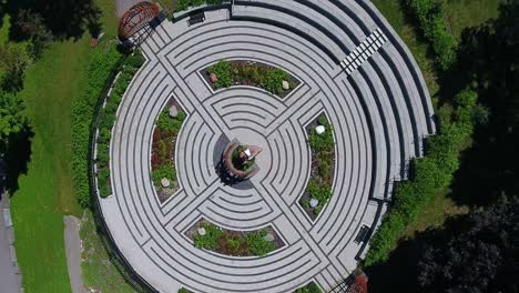 Top-Down-View-of-Cullen-Central-Park-with-a-Circular-Monument-of-Remembrance-in-the-town-of-Whitby,-Canada