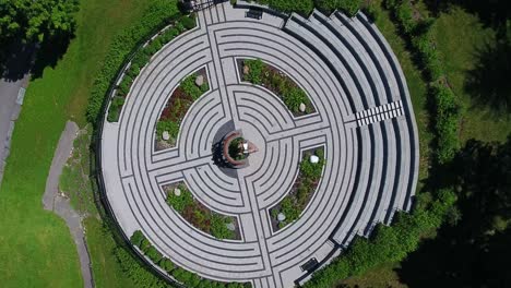 Top-Down-View-Rotating-Around-Cullen-Central-Park-with-its-Circular-Monument-of-Remembrance-in-Whitby,-Canada
