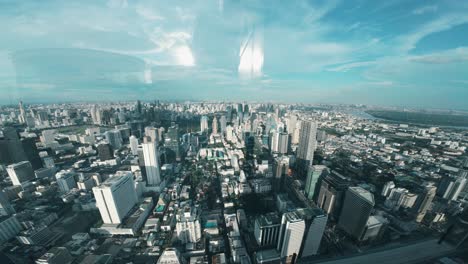 people-suspended-in-a-glass-floored-elevator-snap-photos,-showcasing-a-thrilling-blend-of-modernity-and-daring-heights-in-Bangkok