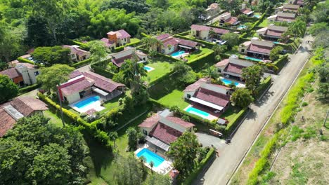 Aerial-view-of-fincas-with-pools-next-to-Panaca-in-Quindio-Colombia