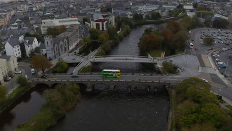 The-pedestrian-bridge-in-Galway,-the-River-Corrib,-the-cathedral
