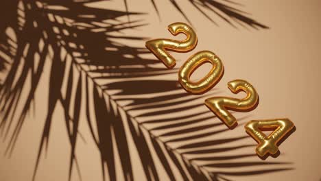 Golden-ballon-2024-on-Silhouetted-Palms-brown-background