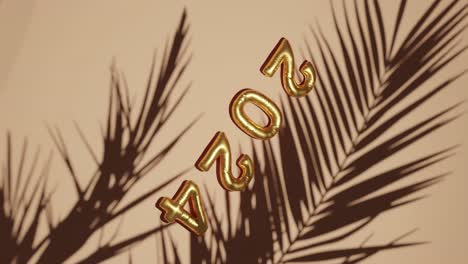 Golden-ballon-2024-on-Silhouetted-Palms-brown-background-vertical