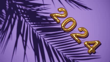 Golden-ballon-2024-on-Silhouetted-Palms-purple-background