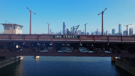 Drone-Flying-Toward-18th-Street-Bridge-Sign-Over-Chicago-River