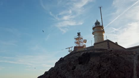 Looking-Up-At-Cabo-de-Gata-Lighthouse-On-The-Coast-Of-Alboran-Sea-In-Almeria,-Spain