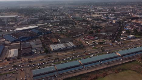 Drone-Video-of-Mbare-High-Density-Suburb-Township-Warehouse-In-Harare,-Zimbabwe