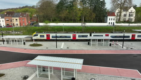 Tracking-Aerial-Shot-of-Train-Leaving-the-Station
