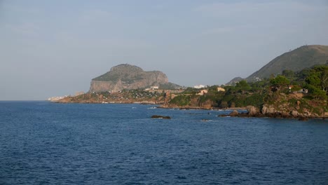 Looking-across-sea-towards-Cefalu,-Sicily,-Italy,-2023