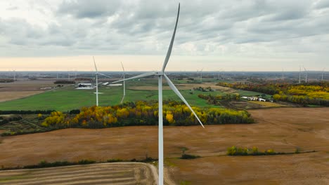 Aerial-rotation-around-a-Wind-Turbine-on-an-early-Autumn-Morning